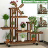 Iun3126695 Meco Multi Tier Pine Wood Flower Rack Shelf Plant Wheel