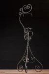 Wrought Iron Adjustable Floor Stand. Fixed Price $800.00.