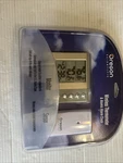 Sealed Oregon Scientific RMR602A Wireless Thermometer & Atomic Alarm Clock W001. Fixed Price $49.99.