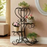 Unho 4 Tier Metal Plant Stand Indoor Outdoor Garden Flower Pot Shelf Rack. Fixed Price $40.81.