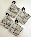 Easter Eggs & Bunnies Pot Holders (set Of 4). Fixed Price $30.00.