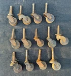 Lot (12) Vintage Antique Wooden Wheel Casters Iron Stem Restore Hardware. Fixed Price $19.99.