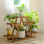 Strong Sturdy Wooden Plant Stand 6 Tier Triangular Flower Pot Display Shelf Rack. Fixed Price $31.94.