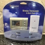 Sealed Oregon Scientific RMR602A Wireless Thermometer & Atomic Alarm Clock. Fixed Price $49.98.