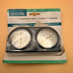 La Crosse 104-288BL-TBP Blue Analog Thermometer & Humidity Gauge Damaged. Fixed Price $8.00.