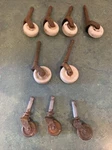 Antique Lot Of 9 Casters *6 Porcelain And 3 Iron. Fixed Price $25.00.