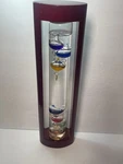 Galileo 7 Colored Glass Thermometer 14.5-INCHES Tall With Cherry Wood Frame. Fixed Price $68.00.
