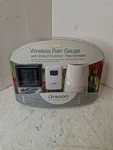Oregon Scientific Wireless Rain Gauge With Thermometer RGR126 New Open Box. Fixed Price $55.00.