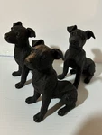 Potty Feet Sitting Dog Trio Set Of Plant. Fixed Price $24.00.