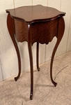Antique Oak Low Petite Stand With Bombay Sides. Fixed Price $445.00.