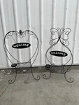 Black Metal Solar Foldable Plant Stand Curved Legs Decorative Welcome Sign. Fixed Price $38.99.