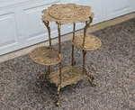 Victorian Cast Iron Plant Stand, Multi Platform, Gold Finish, Ornate W/ Cherubs. Fixed Price $450.00.